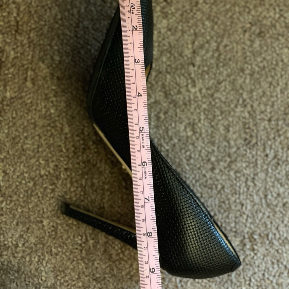 Diane Von Furstenberg heels.